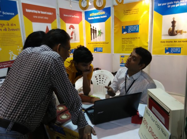 SmartGuru Expert Team interacting with the visitors at exhibition stall at the National Book Fair, Ahmedabad 2016